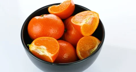 Rotating fresh tangerines isolated on white background Stock Footage 102267034