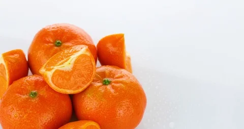 Rotating fresh tangerines isolated on white background Stock Footage 102267876
