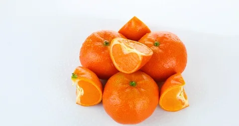 Rotating fresh tangerines isolated on white background Stock Footage 102269429