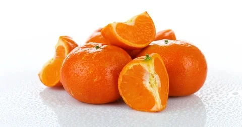 Rotating fresh tangerines isolated on white background	 Stock Footage 102269595