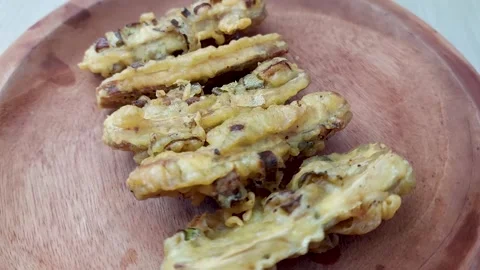 Rotating fried tempe, delicious and tasty fried tempe Stock Footage 253248983