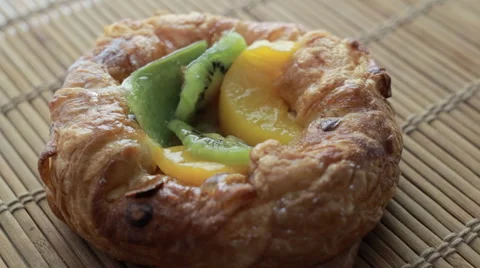 Rotating Fruit cake on bamboo napkin Stock Footage 60933551