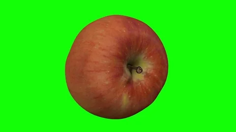 Rotating Fuji Apple on Green Background 02 Stock Footage 79475967