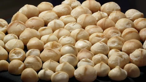 Rotating Full Frame Pattern of Peeled Macadamia Kernels. 動画素材 332835436