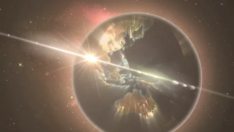 Rotating globe showing lights pulsing, sun rising casting flare, forming blue Stock Footage 313329585