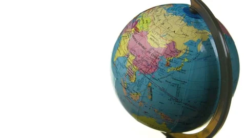 Rotating globe, white backdrop Stock Footage 79549887