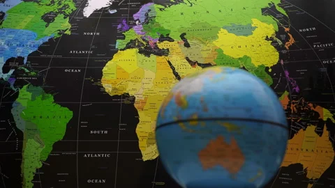 Rotating Globe On World Map Background. Video stock 124521192