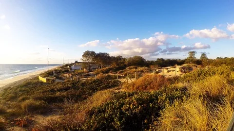 Rotating go pro time-lapse sunset beach clouds moving - panorama Stock Footage 108098137
