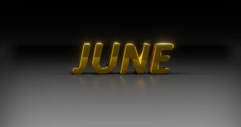 Rotating gold text "JUNE" on a dark background. Stock Footage 252145308