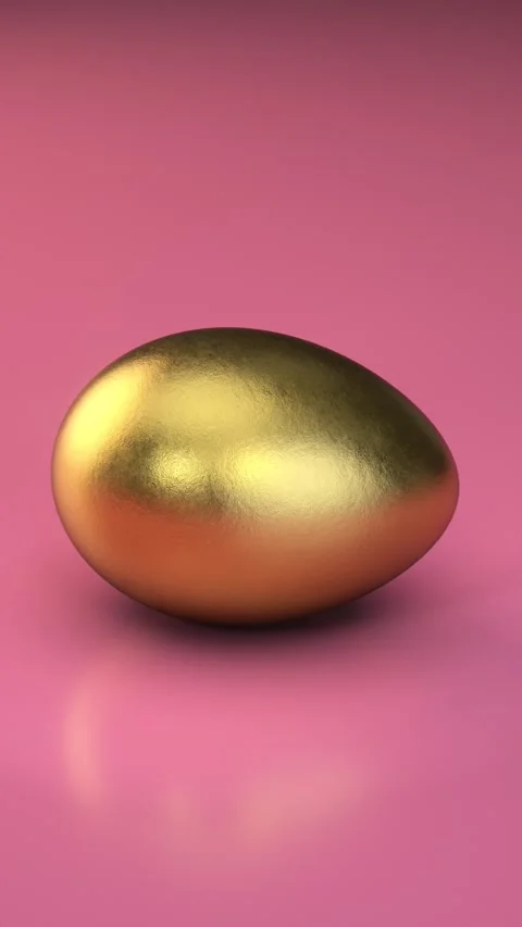 Rotating Golden Egg On Pink Backdrop Stockbeeldmateriaal 302384983