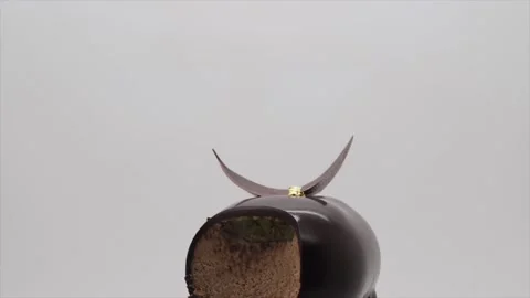 A Rotating Gourmet Chocolate Cake WIth A Bite Missing - HD Vídeos de archivo 132296865