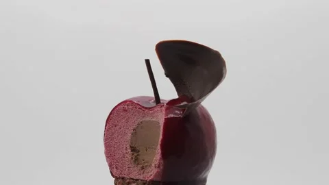 A Rotating Gourmet Dessert With A Bite Missing - London, UK Vídeos de archivo 132500875