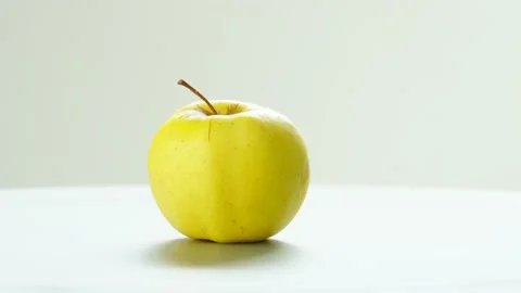 Rotating green apple with white background Stock Footage 234900034