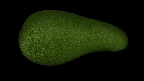 Rotating Green Avocado on Black Background (Looping) Stock Footage 97634962