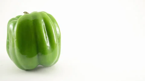 Rotating Green Pepper Against White - Dolly Right Stock Footage 22803437