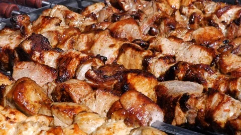 Rotating grilled tasty meat Stock Footage 88676991