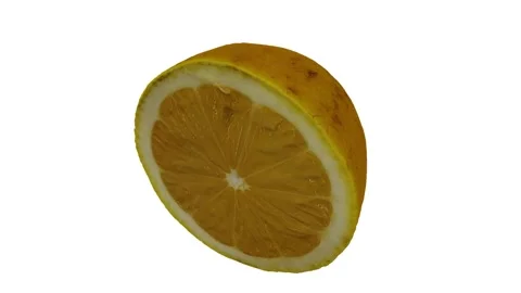 Rotating Half Lemon on White Background (Looping) Stock Footage 151184723