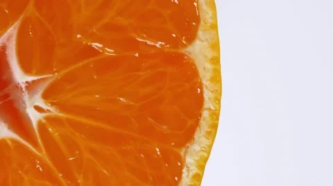 Rotating half of a ripe tangerine Stock Footage 68349102