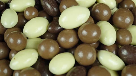 Rotating Hazelnuts And Almonds In Chocolate Glaze. Stock Footage 229465694