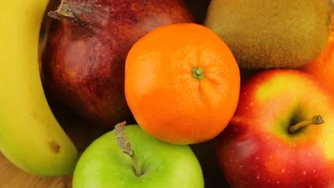Rotating a heap of different fruits. 스톡 동영상 151585034
