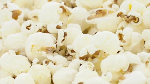Rotating heap of popcorn in the bowl Stock Footage 40098133