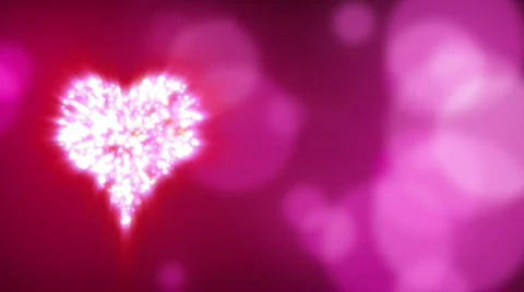 Rotating heart shape on blured background - Seamless loop 1080p Stock Footage