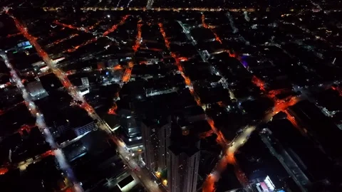 Rotating High Altitude Night Drone Over Metropolitan Street Grid Stock-Footage 331184645