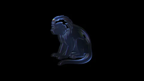 Rotating holographic monkey on black background Stock Footage 316235833
