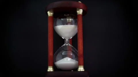 Rotating Hourglass on the Black Background. Stock Footage 86418752