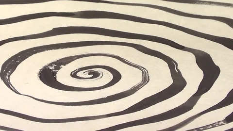 Rotating hypnotic spiral, artistic ink and paper Stock Footage 72562760