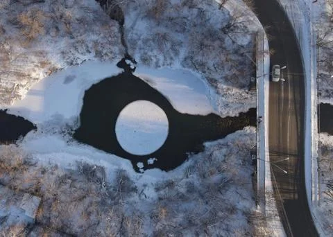 Rotating ice disk on the river (ice carousel in Siberia) Stock Photos
