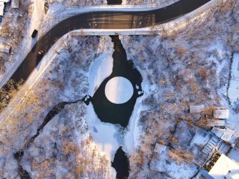 Rotating ice disk on the river (ice carousel in Siberia) Stock Photos