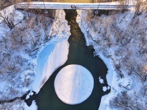 Rotating ice disk on the river (ice carousel in Siberia) Stock Photos