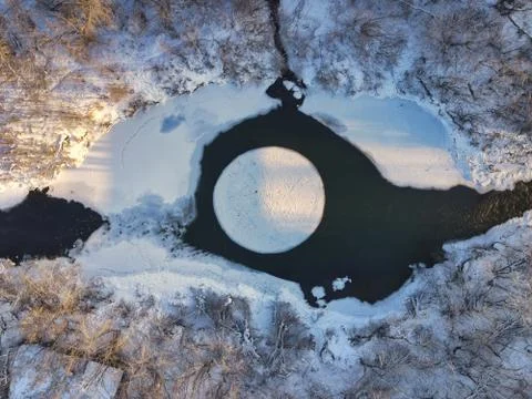 Rotating ice disk on the river (ice carousel in Siberia) Stock Photos