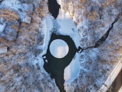 Rotating ice disk on the river (ice carousel in Siberia) Stock Photos