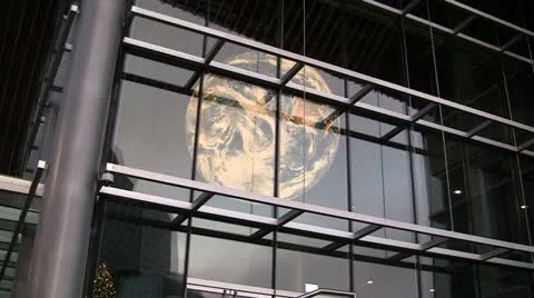 Rotating Illuminated Atrium World Globe Through Building Front Stock Footage 19127959