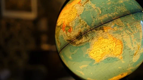 Rotating Illuminated World Globe Built-in LED Bulb. Educational Map. Australia Stock Footage 113685335