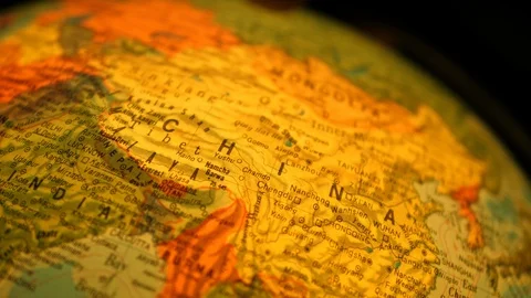 Rotating Illuminated World Globe Built-in LED Bulb. Educational Map. China USA Stock Footage 113687474