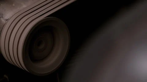 Rotating industrial wheel with dramatic spotlight Stock-Footage 336467533