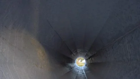 Rotating inside View of Round Metal Tapered Electrical Power Pole  section  with Stock Footage 263901477