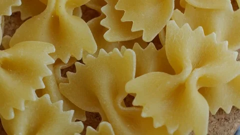 Rotating italian farfalle pasta Stock Footage