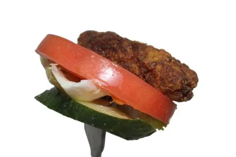 Rotating kebab in fork Stock Photos