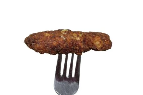 Rotating kebab in fork Stock-Fotos