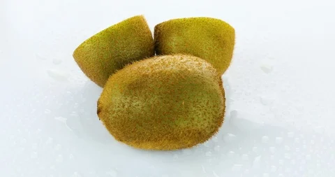 Rotating kiwi on isolated white background Stock Footage 102262339