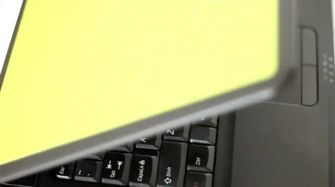 Rotating laptop, isolated Stock Footage