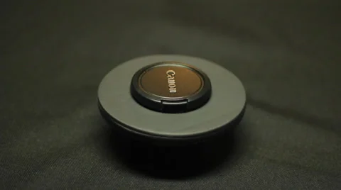 Rotating Lens Cap Stock Footage 32346673