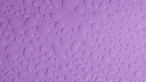 Rotating light purple background with water drops top view Stock Footage 202074924