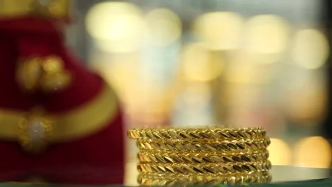 Rotating Luxury Gold Bracelets Close-Up Stock Footage 339704092