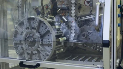 Rotating machine and conveyor belt. Industrial theme Stock Footage 75179462