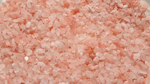 Rotating Macro Coarse Pink Himalayan Salt Crystals Background 스톡 동영상 331851064